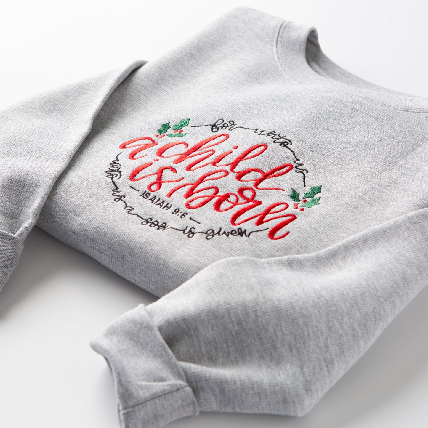 Embroidered A Child is Born Sweatshirt