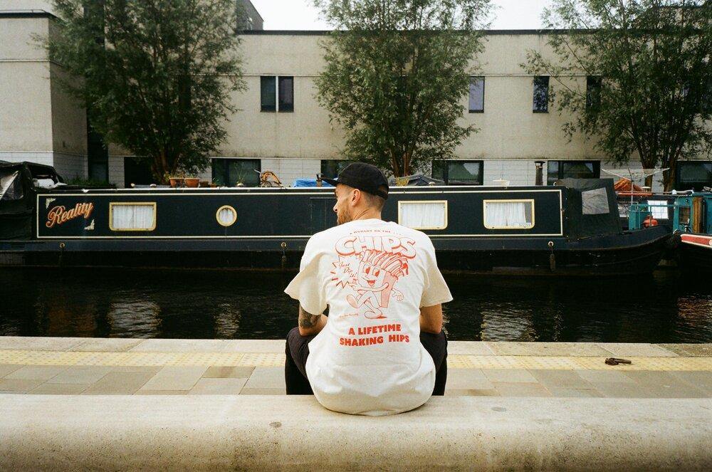 Pomme Frite x UN:IK 'Mr Chips' Tee - Natural
