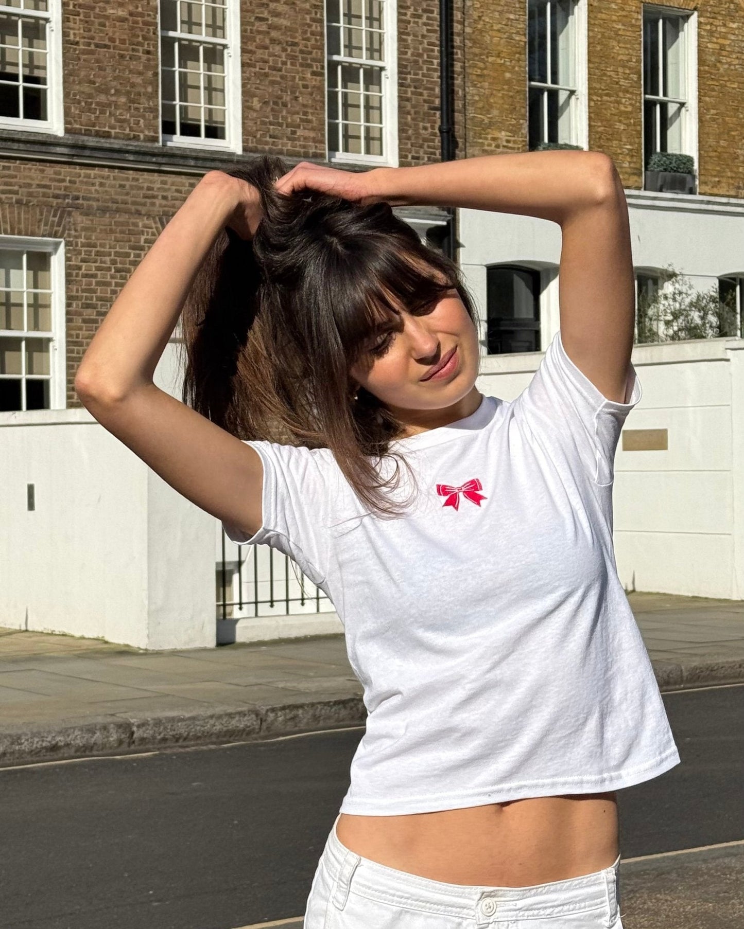 put a bow on it embroidered baby tee